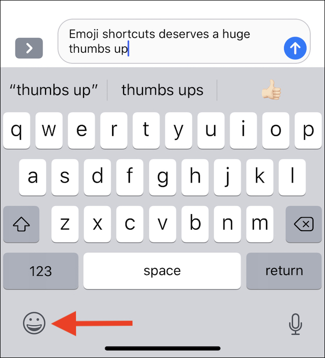 tap the emoji keyboard button